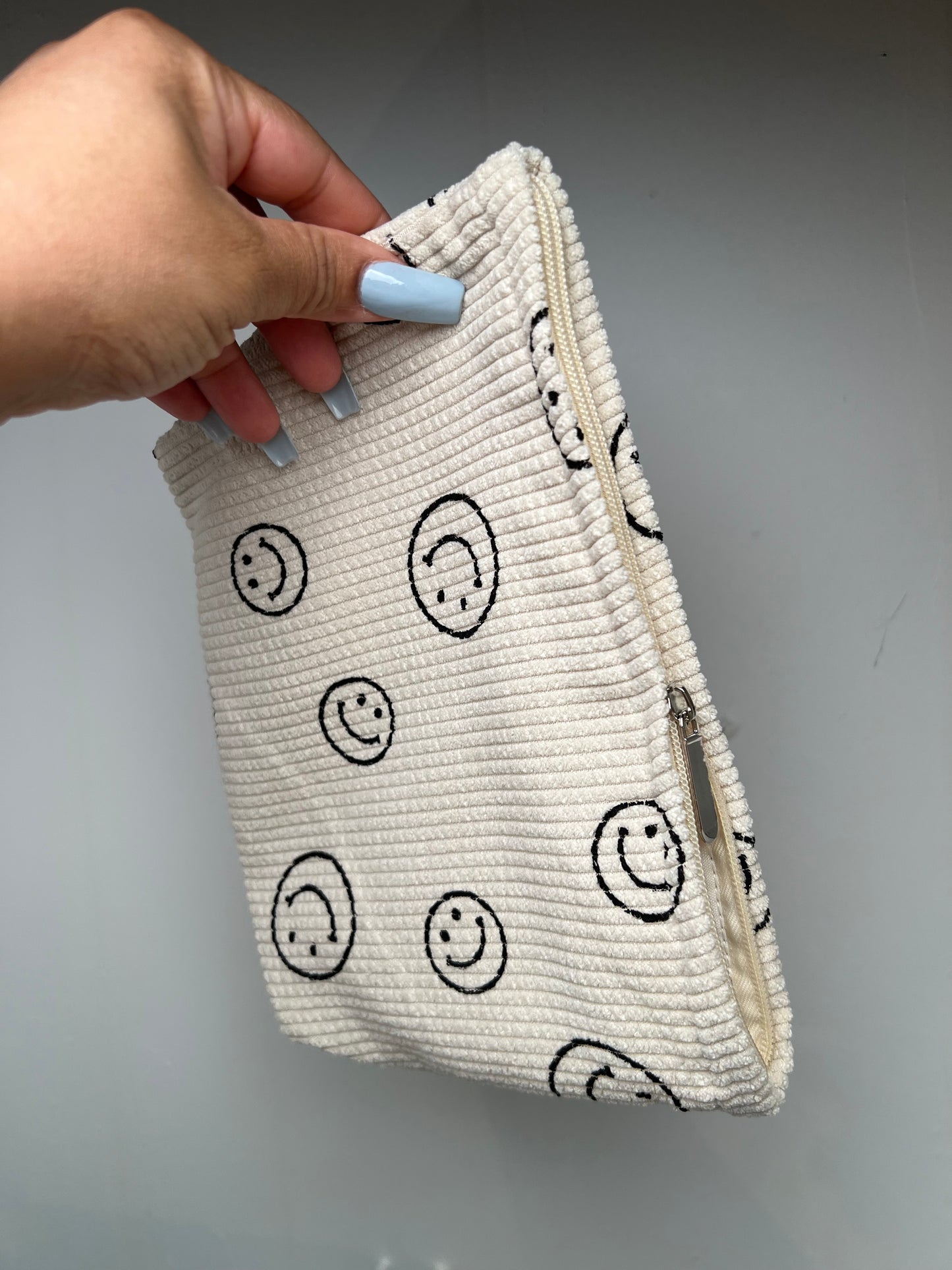 Corduroy smiley travel bag