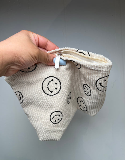 Corduroy smiley travel bag